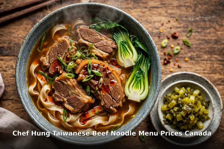 Chef Hung menu prices Canada 2026: steaming bowl of Taiwanese beef noodle soup with braised beef, bok choy and pickled vegetables