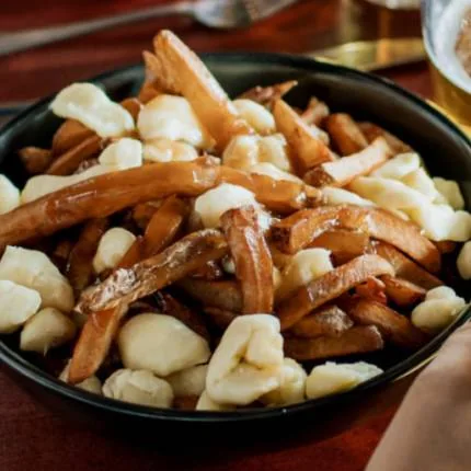 La Cage poutine menu prices Canada